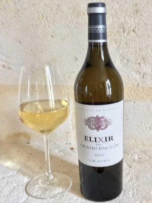 Elixir Blanc du Grand Enclos with Wine Glass