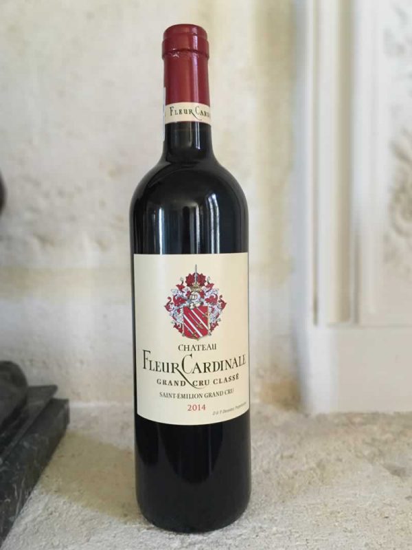 Bottle of Fleur Cardinale red wine from the Bordeaux region