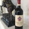 Bottle of Fleur Cardinale red wine from the Bordeaux region