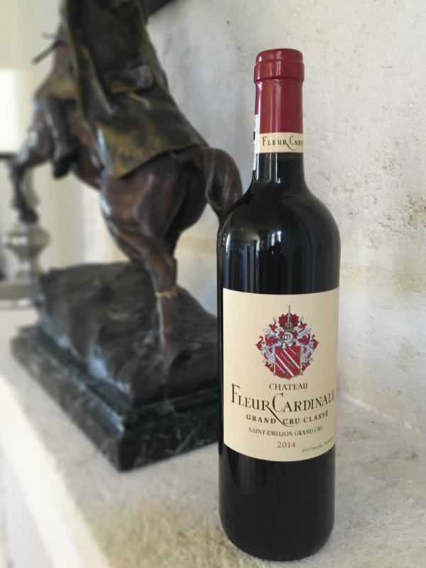 Bottle of Fleur Cardinale red wine from the Bordeaux region