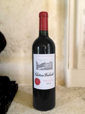 Bottle of Château Fonbadet red wine from the Bordeaux Region