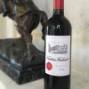 Bottle of Château Fonbadet red wine from the Bordeaux Region