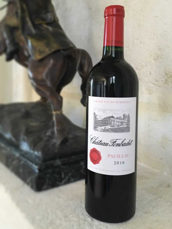 Bottle of Château Fonbadet red wine from the Bordeaux Region